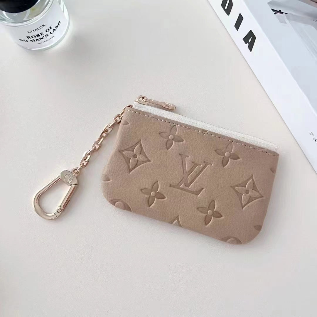 Collection de porte-monnaie gaufrés colorés inspirés de LV avec attache mousqueton