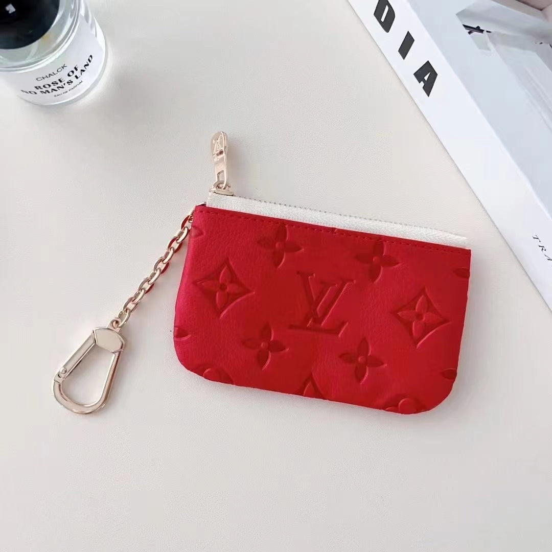 Collection de porte-monnaie gaufrés colorés inspirés de LV avec attache mousqueton