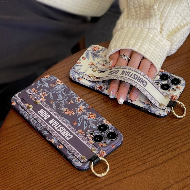 Módní pouzdro na iPhone s fialovým a bílým náramkem  